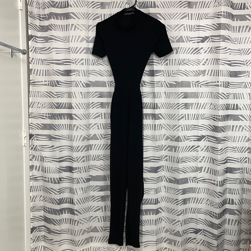 Pretty little things Black jumpsuit Size 4